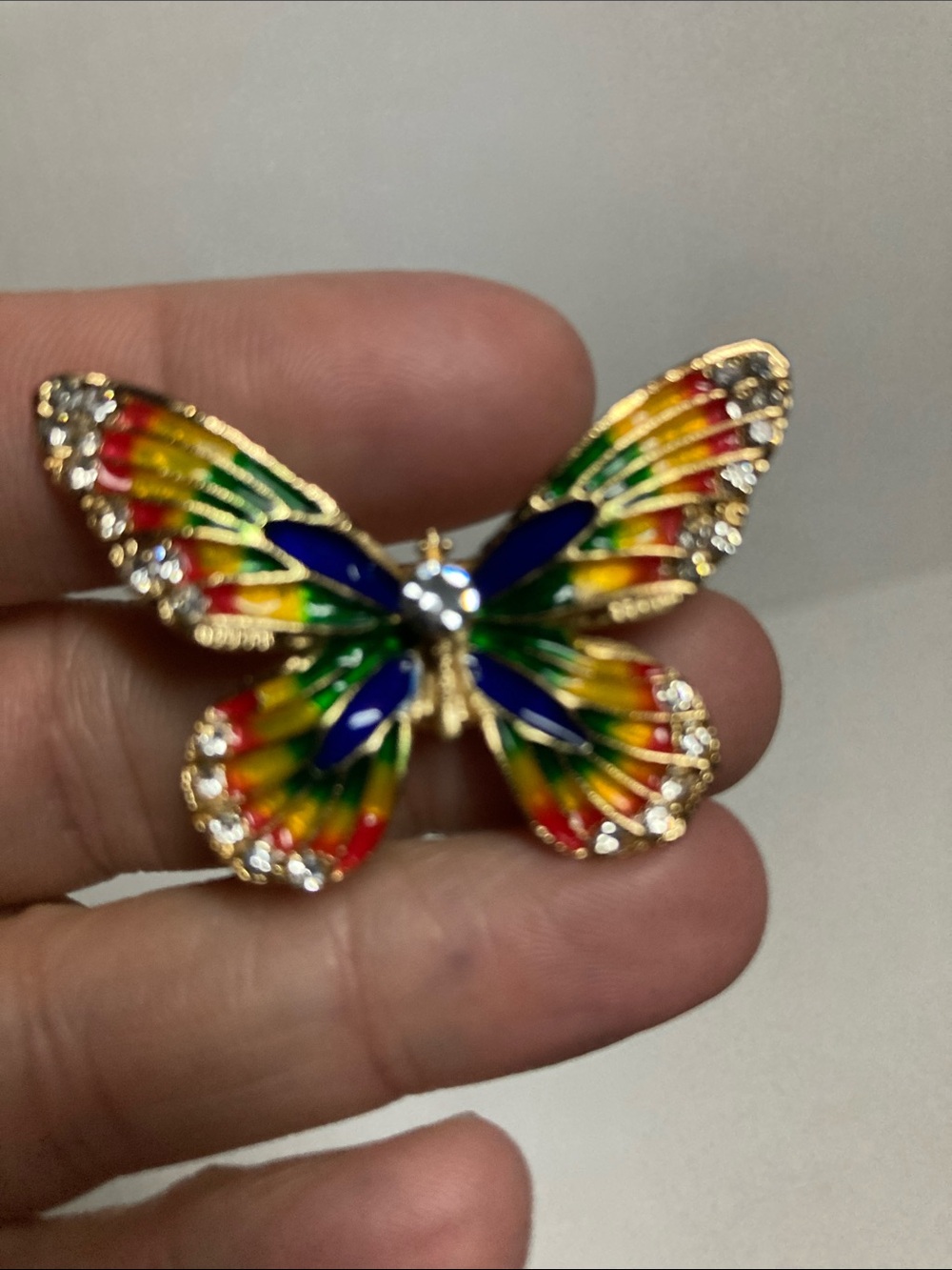 Gold-Tone Rainbow Enamel Butterfly Brooch with Crystal Accents